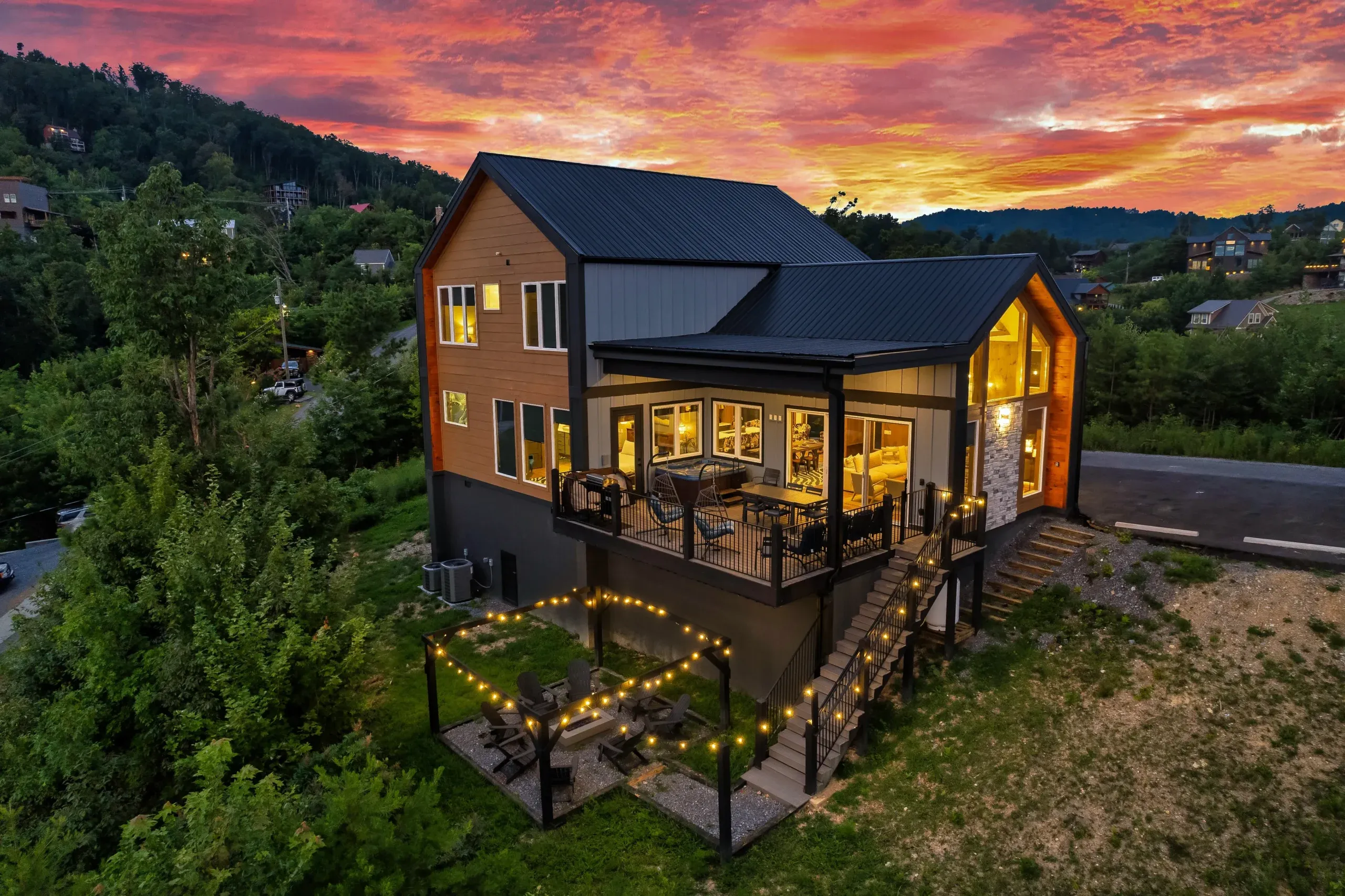 Modern timber chalet nestled among tall pines in the Smoky Mountains
